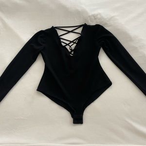 Black long sleeve body suit. Sexy, stretchy, like new!